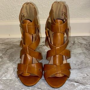 Heart In D brown strap heels.